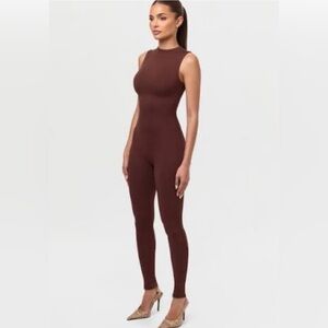 Naked wardrobe sleeveless mockneck jumpsuit xs